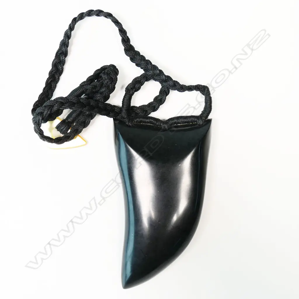 Te Kaha large carved pounamu rei niho (eye tooth) pendant, Image 1++